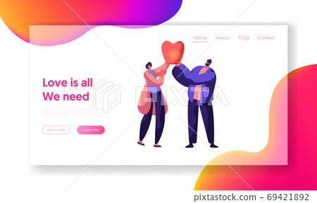 Boy and Girl Launch Sky Lantern in the Park 69421892