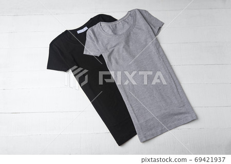 Black and grey blank t-shirt. Mockup. Knitted cotton t-shirt Black and grey blank t-shirt. Mockup. Knitted cotton t-shirt 69421937