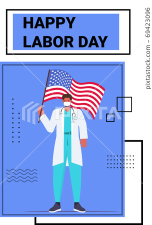 doctor in uniform holding USA flag labor day celebration medical worker wearing mask to prevent coronavirus 69423096