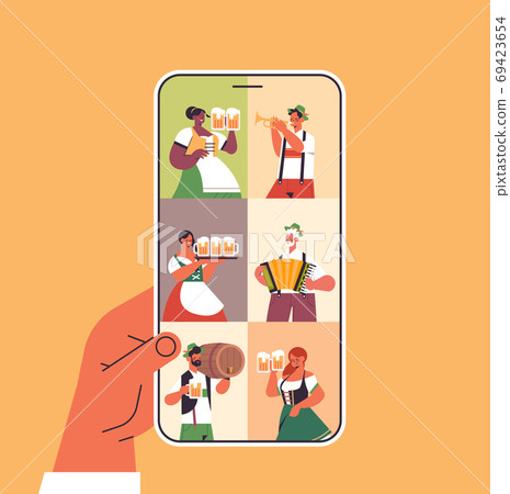 people on smartphone screen celebrating Oktoberfest party beer festival online communication concept people on smartphone screen celebrating Oktoberfest party beer festival online communication concept 69423654