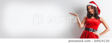Christmas woman with open hand palm 69424130