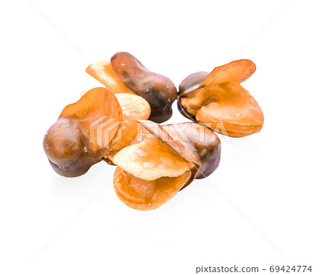 salted broad beans isolated on white salted broad beans isolated on white 69424774