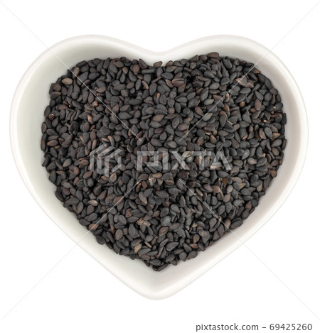 black sesame in heart shaped plate black sesame in heart shaped plate 69425260