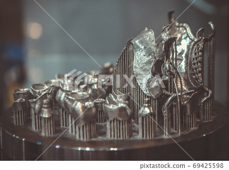 Object printed on metal 3d printer close-up. 69425598