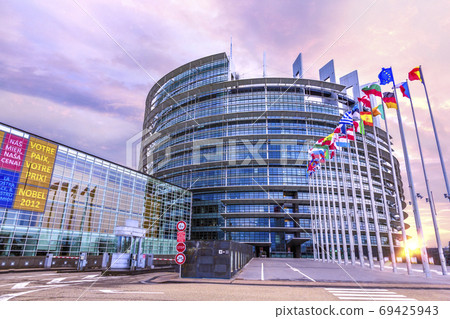 STRASBOURG, 25 December 2012 - Sunrise on the European parliament building promoting its Nobel price panels in Strasbourg, France STRASBOURG, 25 December 2012 - Sunrise on the European parliament building promoting its Nobel price panels in Strasbourg, France 69425943