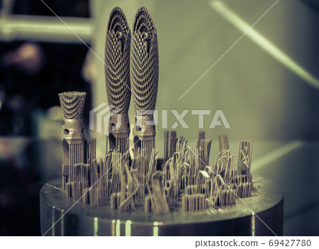 Object printed on metal 3d printer close-up Object printed on metal 3d printer close-up 69427780