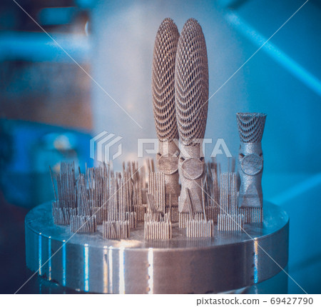 Object printed on metal 3d printer close-up Object printed on metal 3d printer close-up 69427790