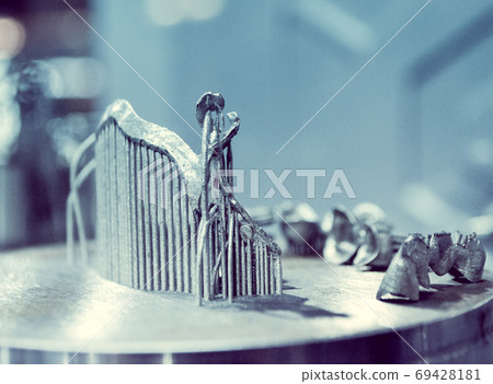 Object printed on metal 3d printer close-up 69428181