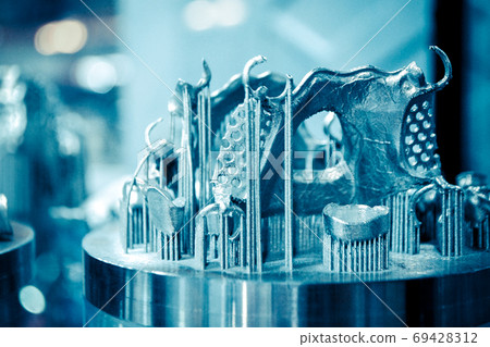 Object printed on metal 3d printer close-up 69428312