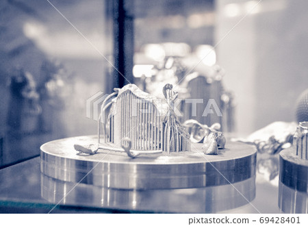 Object printed on metal 3d printer close-up. 69428401