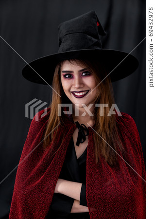 Portrait of asian woman in halloween cloth Portrait of asian woman in halloween cloth 69432978