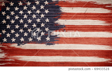 Vintage American flag on wooden texture. 69433528
