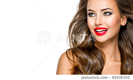 Beautiful  happy woman with bright makeup and long hair 69436505