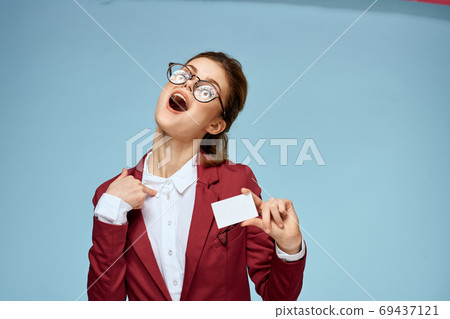 Business woman red jacket business card official glasses blue background 69437121
