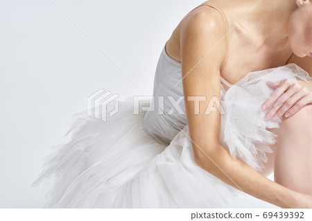 Ballerina in white tutu elegant dance performed sensuality silhouette light background Ballerina in white tutu elegant dance performed sensuality silhouette light background 69439392