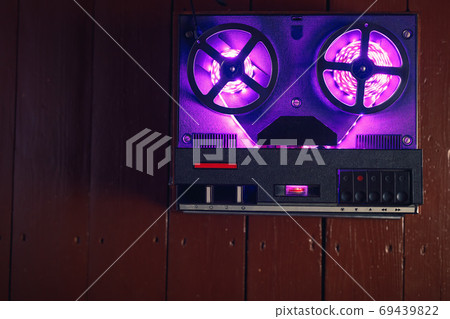 reel to reel audio tape recorder with purple led light strip. VU meter with "Recording" title 69439822