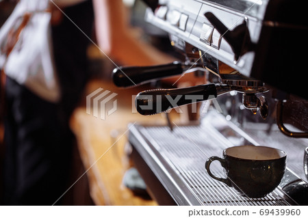 a coffee maker with a cup a coffee maker with a cup 69439960
