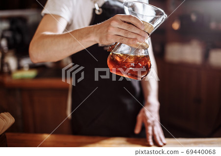 waiter with chemex at the cafe waiter with chemex at the cafe 69440068