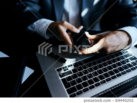 Laptop on the table businesswoman with a pen of technology communication official 69440202