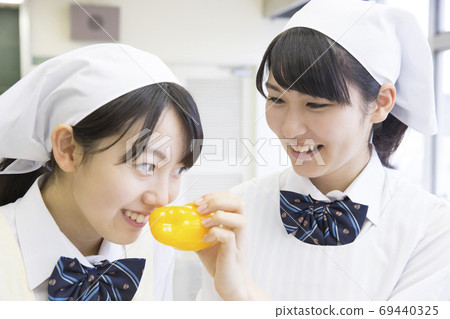 Students doing cooking training 69440325