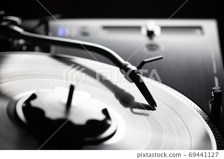 abstract turntable with vinyl record 69441127
