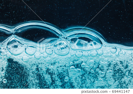 abstract liquid soap bubbles blue background 69441147