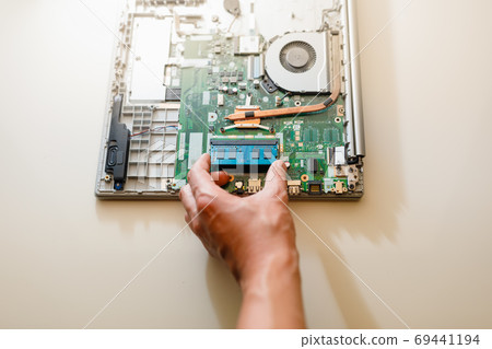 memory module ddr4 ram installation in laptop by hand memory module ddr4 ram installation in laptop by hand 69441194