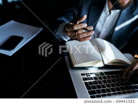 businesswoman in a cafe with a book on the table documents a cup of coffee work lifestyle businesswoman in a cafe with a book on the table documents a cup of coffee work lifestyle 69441383
