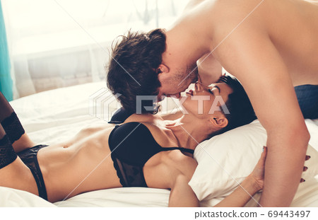 Sexual foreplay of adult beautiful passionate couple Sexual foreplay of adult beautiful passionate couple 69443497