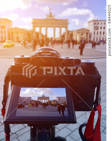 Photographer taking picture in brandenburger tor at Berlin Germa 69444025