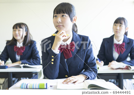 School girls studying School girls studying 69444491