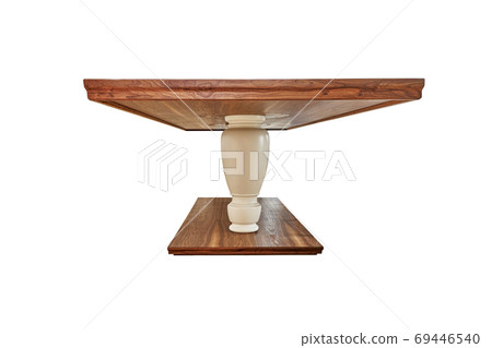 Wooden dinner table on massive legs with dishware isolated against white background Wooden dinner table on massive legs with dishware isolated against white background 69446540