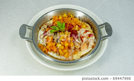 Pan-fried eggs on the pan white background Pan-fried eggs on the pan white background 69447998