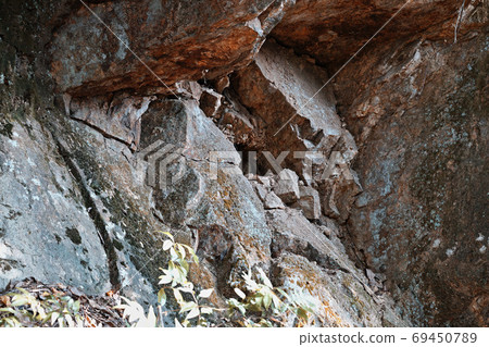 Landscape photo of rock wall 69450789