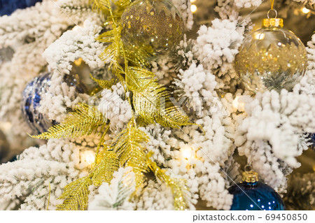 Christmas tree with colorful baubles. Holidays and decor concept. 69450850