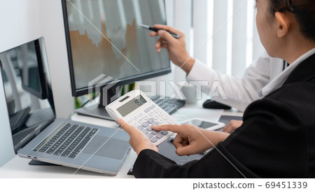 Business team investment trading Analysing data, graphs and repo Business team investment trading Analysing data, graphs and repo 69451339