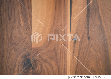 Texture of black walnut wood with some sapwood Texture of black walnut wood with some sapwood 69451696
