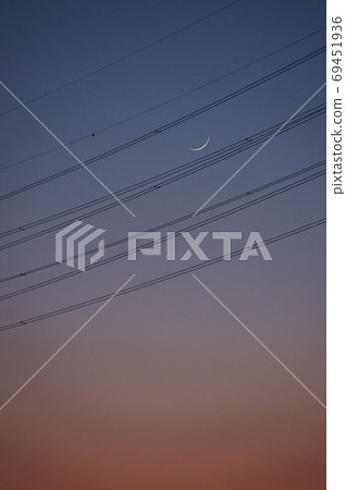 Power lines and crescent moon Power lines and crescent moon 69451936