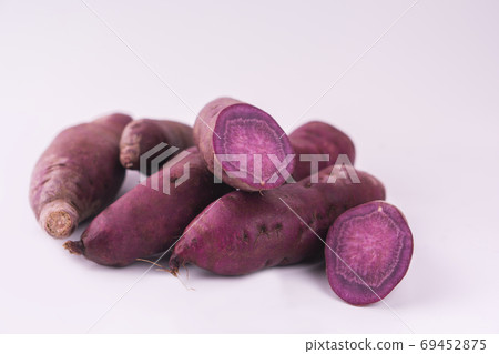 Sweet potato on white background. 69452875