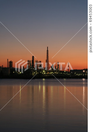 Morning glow of factory area Morning glow of factory area 69453003