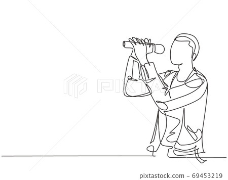 One single line drawing of young happy male rock singer holding microphone and singing on music festival stage 69453219