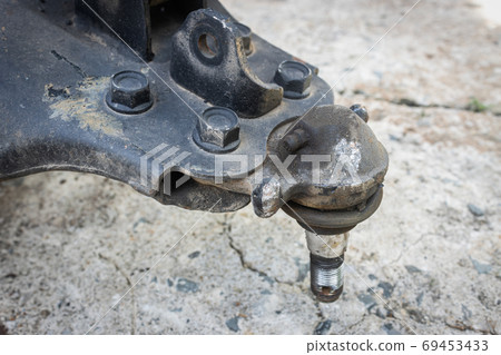 Zoom View Old Auto Part Lower Arm Ball Joint of Car Zoom View Old Auto Part Lower Arm Ball Joint of Car 69453433