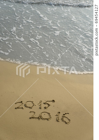 2015 and 2016 year on the sand beach 69454127
