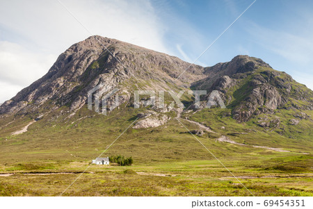 Buachaille Etive Mor. A view of Buachaille Etive Mor in the Scottish highlands. Buachaille Etive Mor is a mountain in the Scottish Highlands. Buachaille Etive Mor. A view of Buachaille Etive Mor in the Scottish highlands. Buachaille Etive Mor is a mountain in the Scottish Highlands. 69454351
