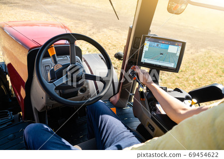 Driving a modern tractor 69454622
