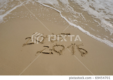 2015 and 2016 year on the sand beach 69454701