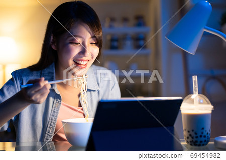 woman watch video on tablet woman watch video on tablet 69454982