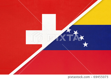 Switzerland and Venezuela, symbol of national flags from textile. Championship between two countries. Switzerland and Venezuela, symbol of national flags from textile. Championship between two countries. 69455073