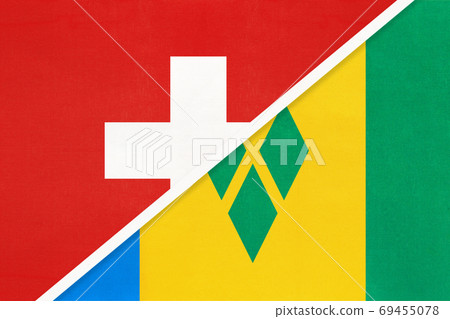 Switzerland and Saint Vincent and the Grenadines, symbol of national flags from textile. Championship between two countries. Switzerland and Saint Vincent and the Grenadines, symbol of national flags from textile. Championship between two countries. 69455078