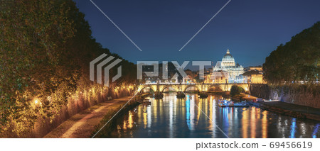 Rome, Italy. Papal Basilica Of St. Peter In The Vatican And Aelian Bridge In Evening Night Illuminations Rome, Italy. Papal Basilica Of St. Peter In The Vatican And Aelian Bridge In Evening Night Illuminations 69456619